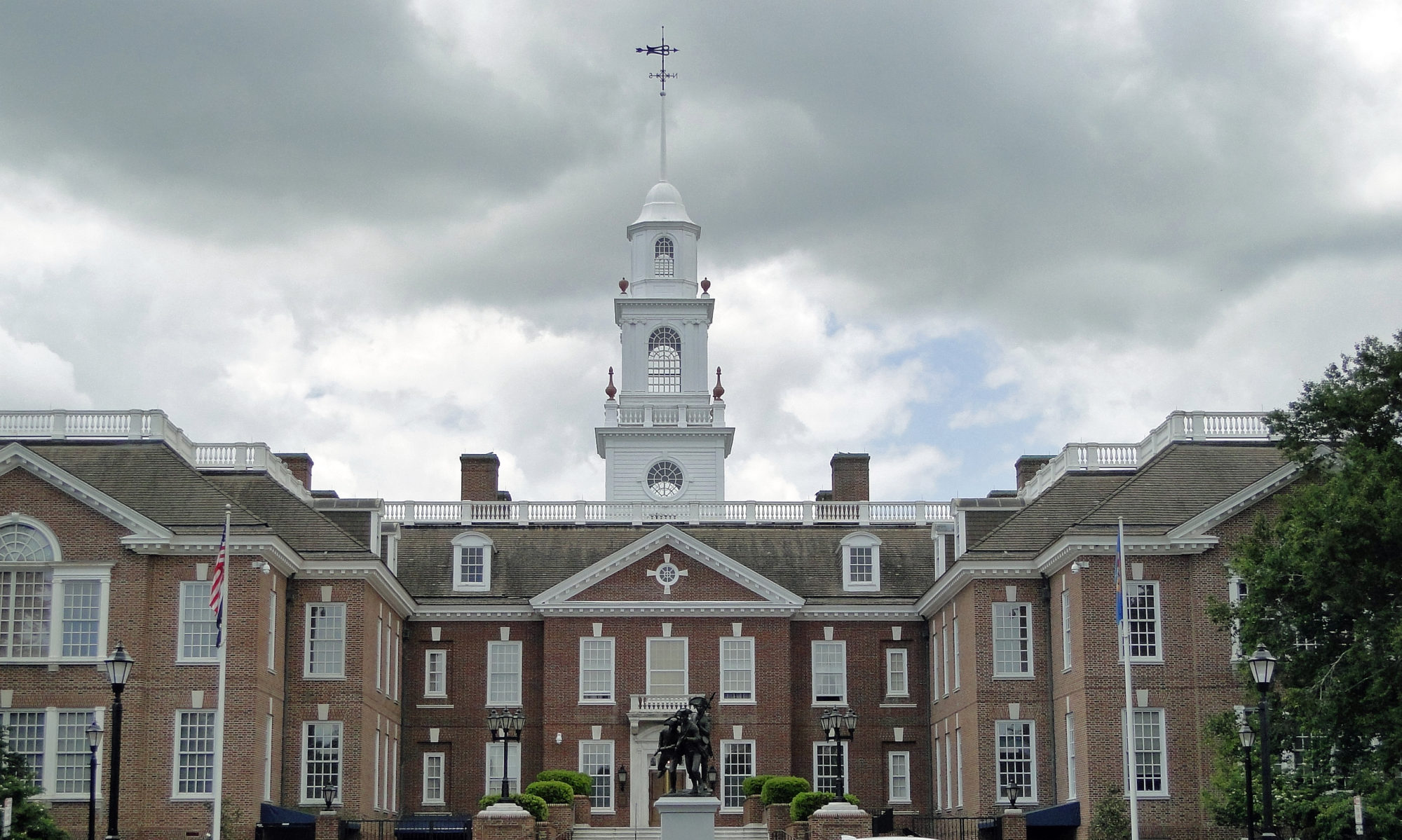 Delaware State Capitol building in Dover (back side showing miltamen statue)
