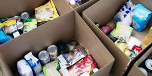 food bank boxes showing bottles, packages and such