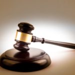 Brown Gavel commonly seen a courtroom and used during official proceedings.