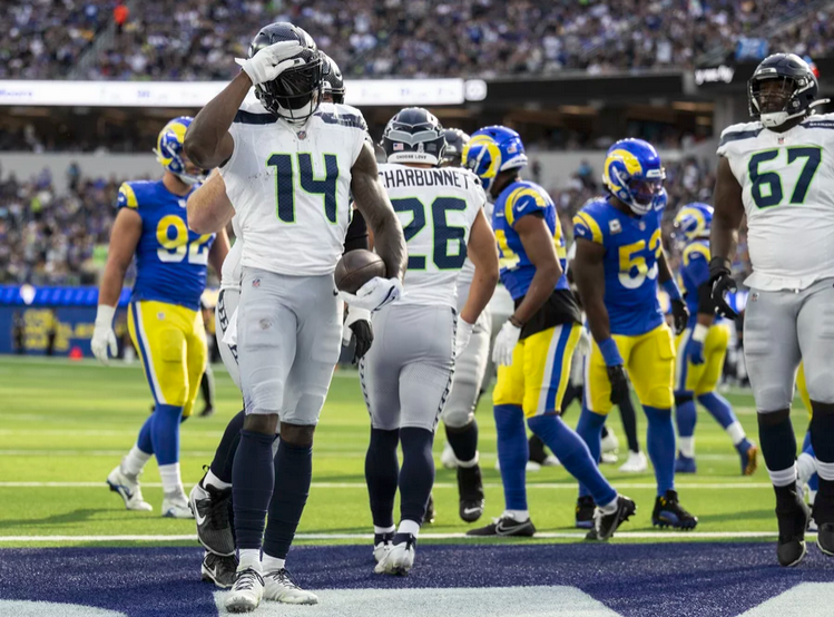 Seattle Seahawks wide receiver DK Metcalf (14) celebrates his touchdown by using American Sign Language during an NFL football game against the Los Angeles Rams, Sunday, Nov. 19, 2023, in Inglewood, Calif.
Kyusung Gong/AP 
