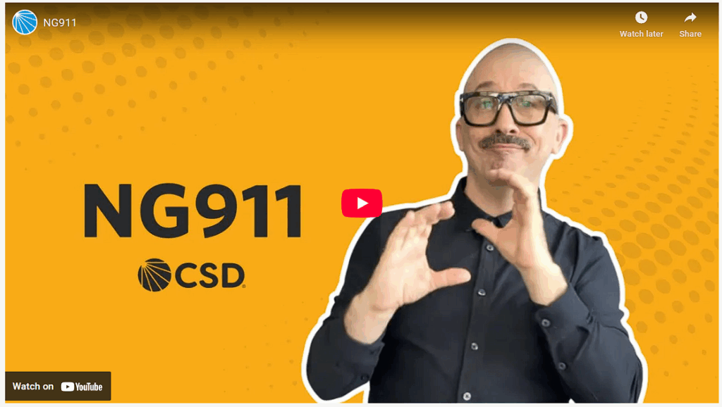 Bald White man with black glasses and shirt. captions on side says NG911 by CSD with yellow background